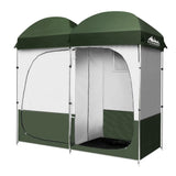 A green Weisshorn Double Camping Shower Toilet Tent with a large double-sided zippered door, set up outdoors.