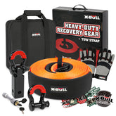 X-BULL 4WD Recovery Kit displayed with a snatch strap, hitch receiver, bow shackles, a durable bag, heavy duty gloves, and stickers.