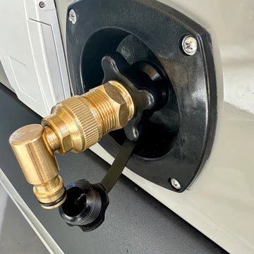 Flat Out brass elbow adaptor connected to caravan threaded water inlet showing neat downward hose connection