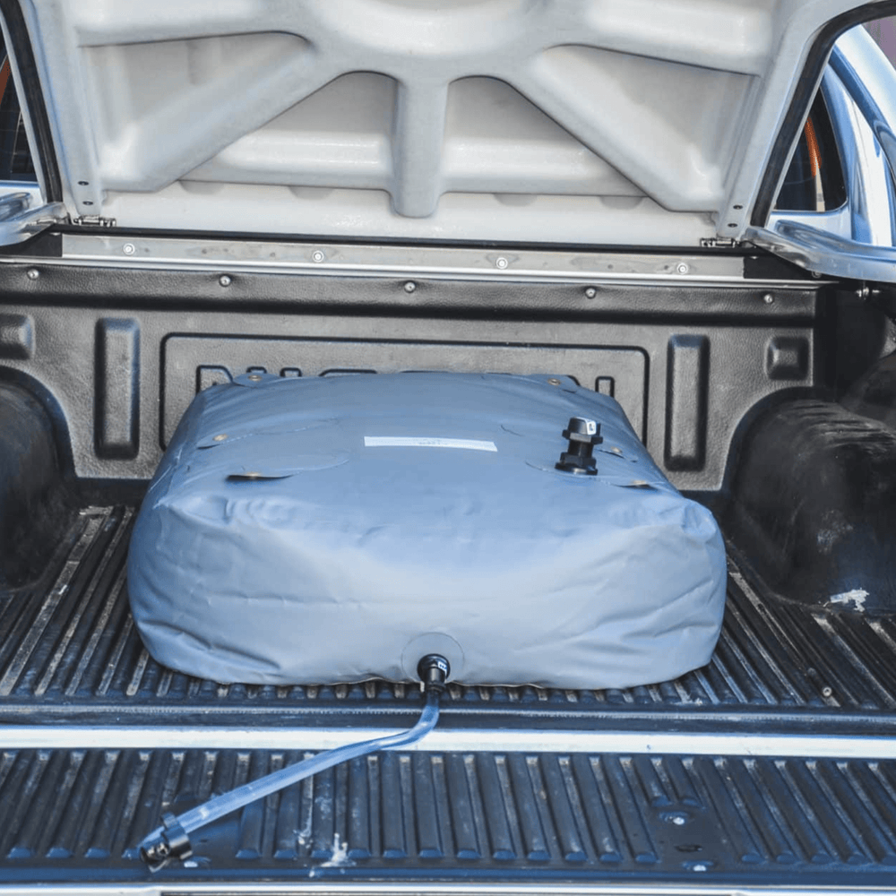Fleximake DW200B 200L drinking water bladder in the tray of a ute or pick-up