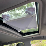 Starlink Mini suction mount installed on vehicle window with cable routed inside for clean power setup