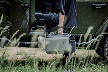 Person carrying a Cybertake S1 Pro portable aircon