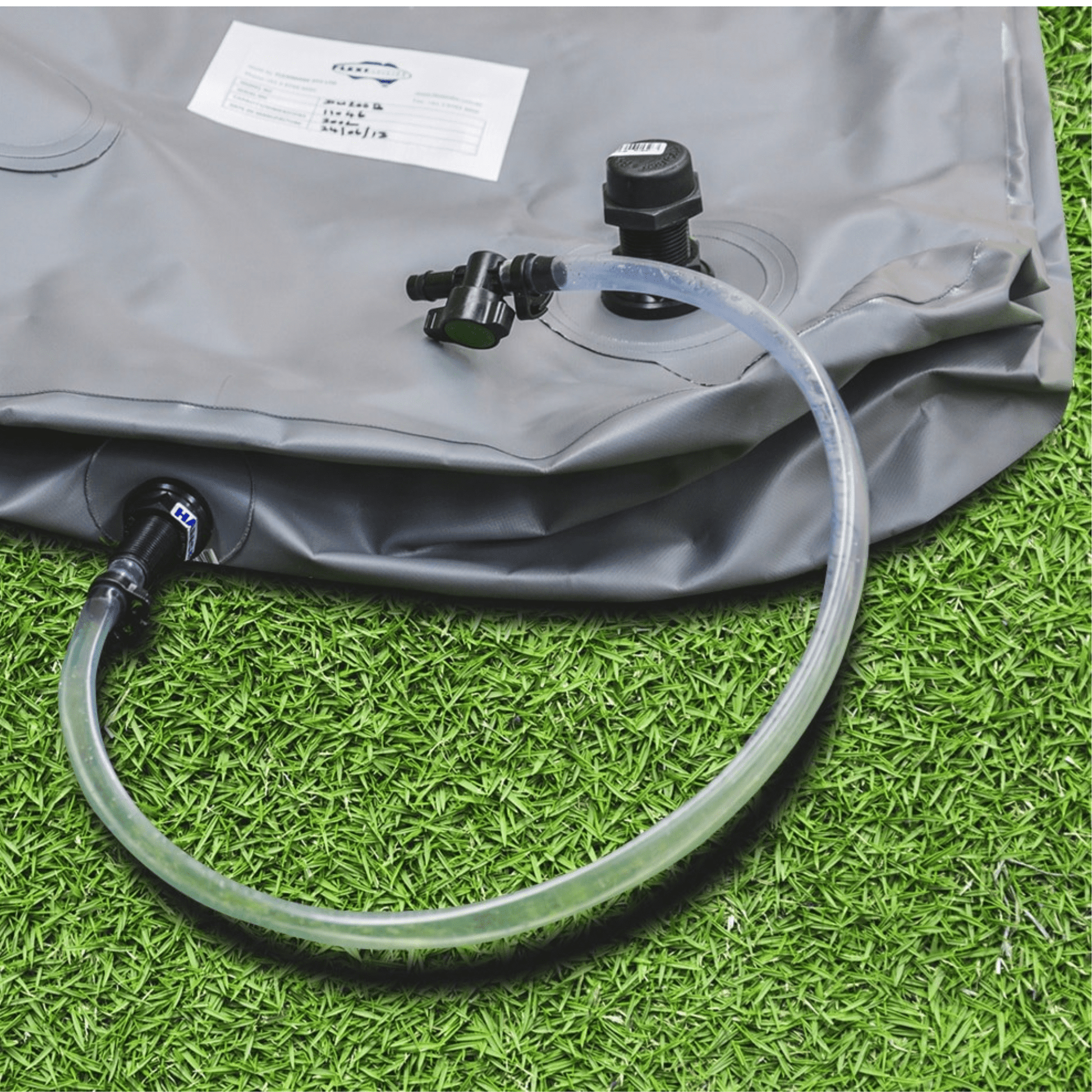 Fleximake DW200B 200L drinking water bladder showing hose and fittings