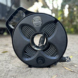 Flat Out Sullage Hose on Narrow Multi-Reel with a caravan in the background.