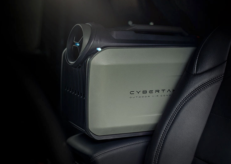 Cybertake S2 Pro portable air conditioner and heater unit in a car
