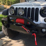 X-BULL electric winch mounted to the front of a four wheel drive