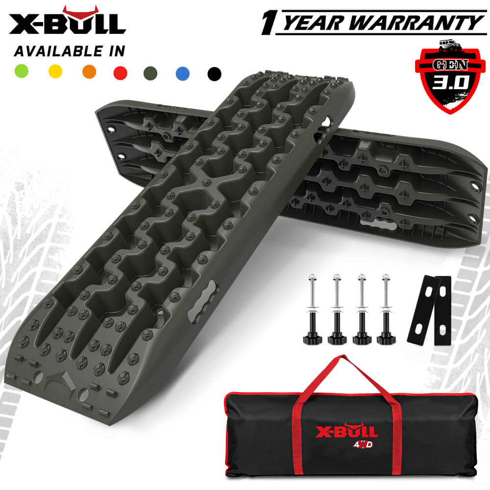 X-BULL Gen 3.0 Recovery Tracks in olive color with included mounting pins and a carry tote, designed for vehicle recovery on tough terrains.