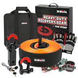 X-BULL 4WD Recovery Kit displayed with a snatch strap, hitch receiver, bow shackles, a durable bag, heavy duty gloves, and stickers.