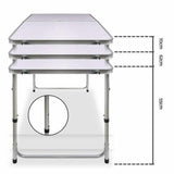 A portable aluminium folding picnic table showing the heights that it can be set-up.