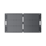 BLUETTI 100W foldable solar panel fully open on white background showing monocrystalline ETFE surface with carry handles on both sides