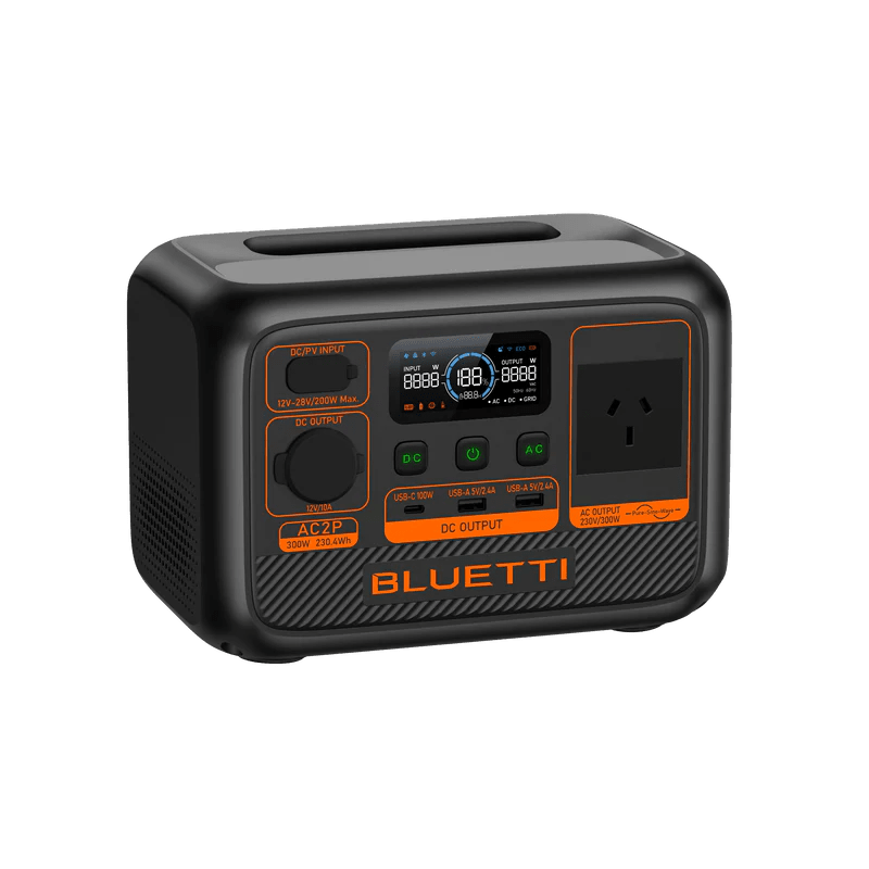 BLUETTI AC2P 300W 230Wh portable power station angled left view showing full port layout including DC input, DC output, LCD screen and AC outlet on black and orange body