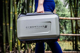 Person holding a Cybertake outdoor air conditioner