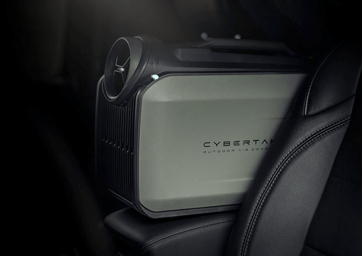 Cybertake S2 Pro portable air conditioner and heater unit in a car