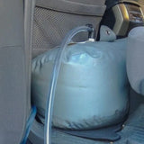 Fleximake 110L PVC water bladder installed in vehicle footwell for caravan touring
